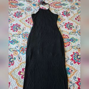 Black halter tie neck maxi dress with open back and slit. Lined. Not sure of the
